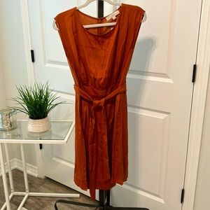 Belted copper colored back zipper dress. Belted.